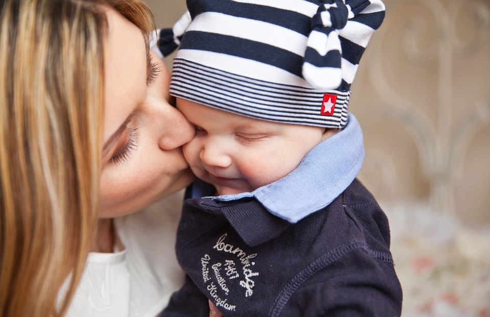 daily mom parent portal kissing baby