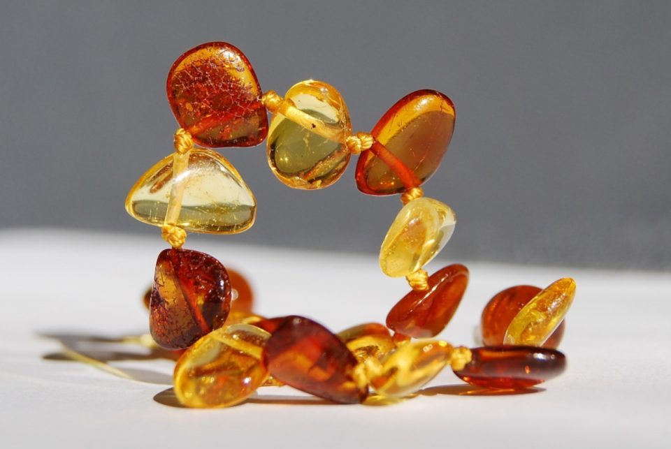 29 Baltic Amber Teething Necklace Royalty-Free Images, Stock Photos &  Pictures | Shutterstock