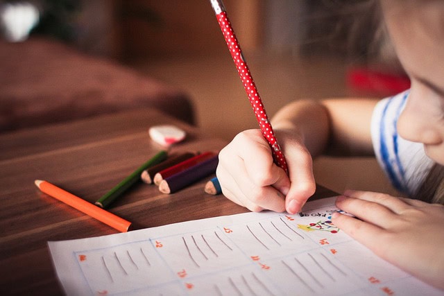 Parent Helping With Homework