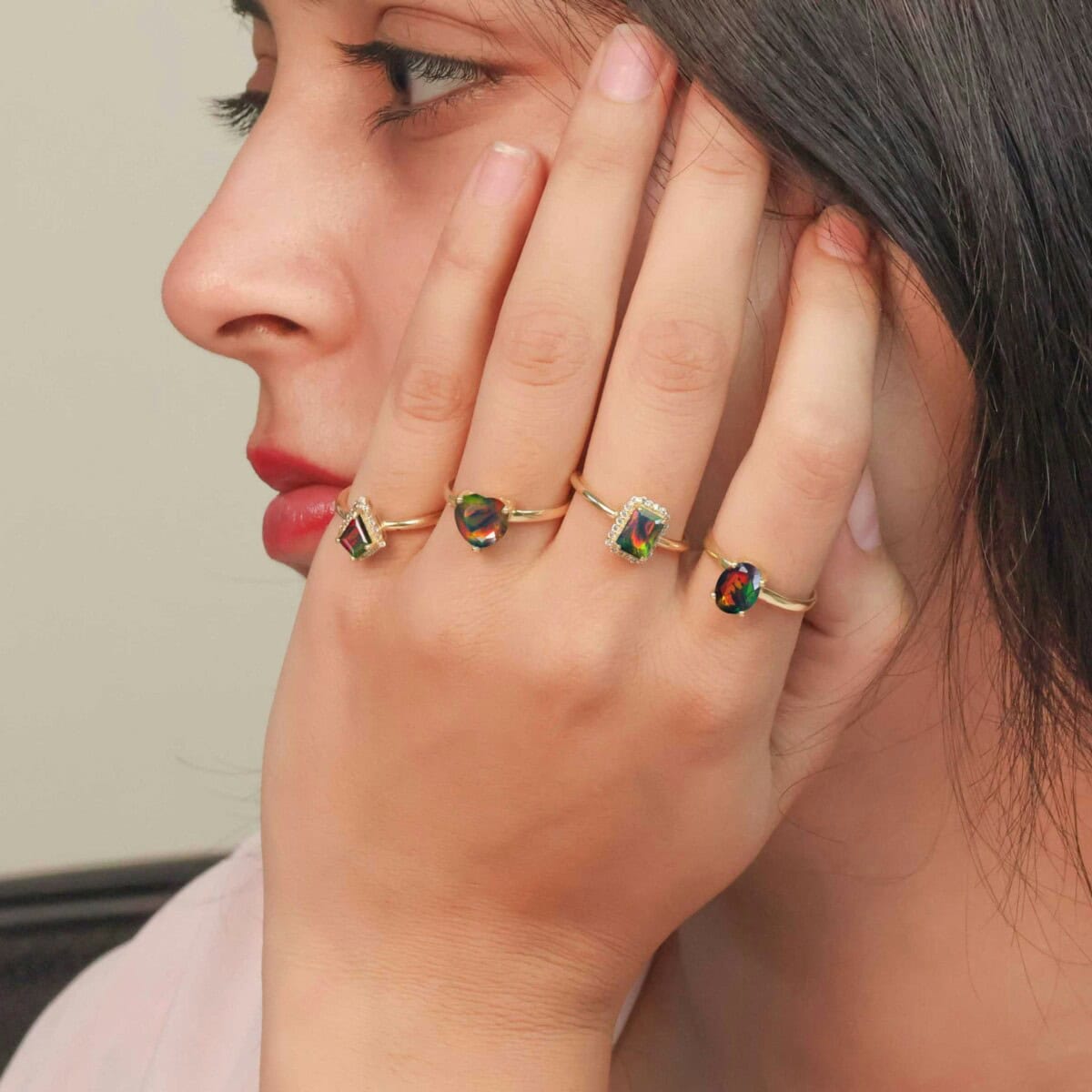 Woman Wearing Opal Jewelry Rings